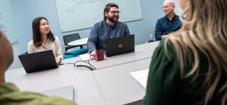People in a meeting at the ISC.